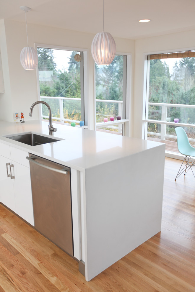 How to Clean Quartz Countertops for Midcentury Kitchen with Pendant Lighting